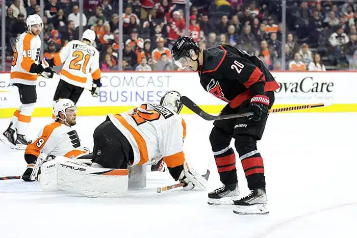 Sebastian Aho #20 of the Carolina Hurricanes reacts after scoring during the first period against the Philadelphia Flyers aft at Wells Fargo Center on March 18, 2023 in Philadelphia, Pennsylvania. 