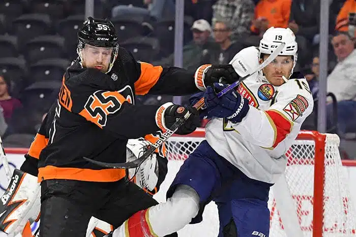 Philadelphia Flyers defenseman Rasmus Ristolainen (55) and Florida Panthers left wing Matthew Tkachuk (19) battle for position during the first period at Wells Fargo Center.