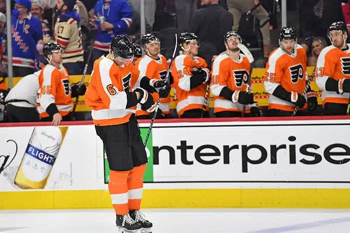 Philadelphia Flyers defenseman Travis Sanheim (6) and teammates head off the ice after overtime loss to the New York Rangers at Wells Fargo Center.