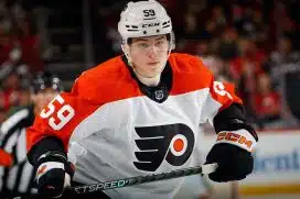 Oliver Bonk #59 of Philadelphia Flyers skates against the New Jersey Devils at a preseason game at the Prudential Center on September 25, 2023 in Newark, New Jersey.