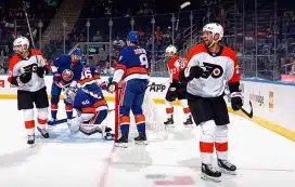 Ryan Poehling #25 of Philadelphia Flyers scores a third period goal against the New York Islanders during a preseason game at UBS Arena on September 27, 2023 in Elmont, New York. The Islanders defeated the Flyers 2-1.