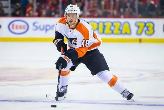 Philadelphia Flyers center Morgan Frost (48) controls the puck against the Calgary Flames during the first period at Scotiabank Saddledome.