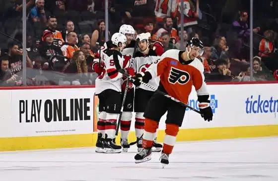 New Jersey Devils center Erik Haula (56) celebrates with teammates after scoring a goal against the Philadelphia Flyers in overtime at Wells Fargo Center.