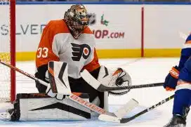 Philadelphia Flyers goaltender Samuel Ersson (33) makes a glove save against the New York Islanders during the second period at UBS Arena.