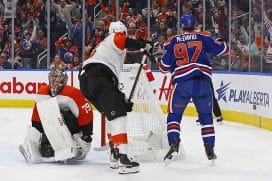 Edmonton Oilers forward Connor McDavid (97) celebrates after scoring a goal against the Philadelphia Flyers goaltender Carter Hart (79) during the first period at Rogers Place.