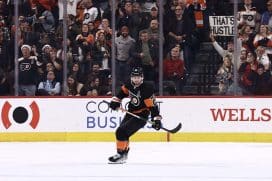 Scott Laughton #21 of the Philadelphia Flyers looks on after scoring during the second period against the New York Rangers at Wells Fargo Center on December 17, 2022 in Philadelphia, Pennsylvania.