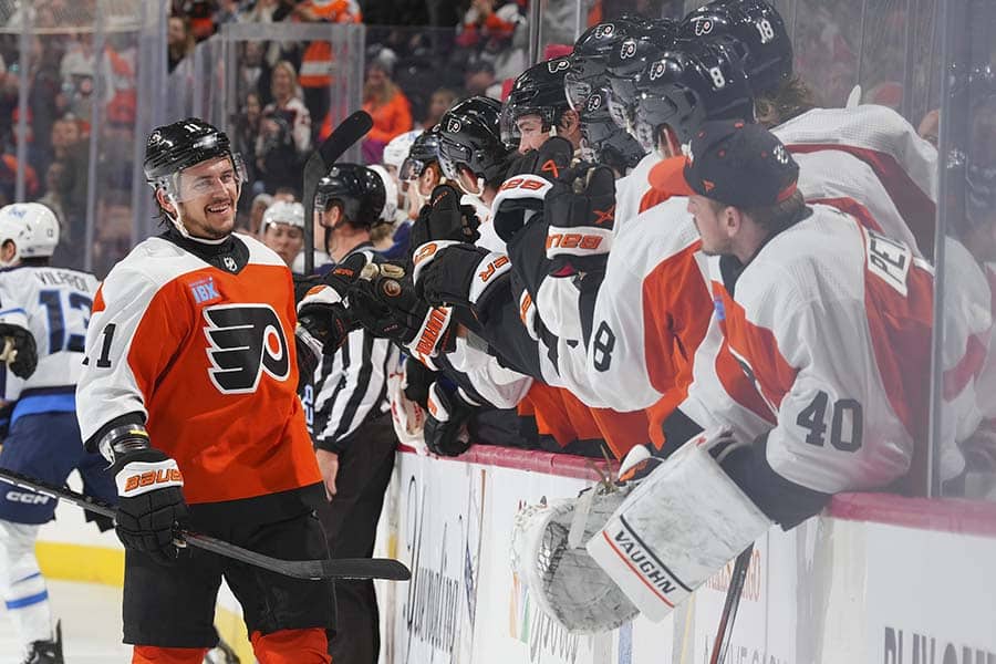 Travis Konecny #11 of the Philadelphia Flyers celebrates with teammates after scoring a goal against the Winnipeg Jets in the first period at the Wells Fargo Center on February 8, 2024 in Philadelphia, Pennsylvania.