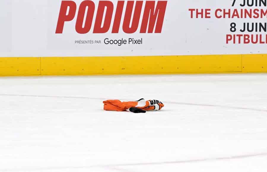 A fan’s Philadelphia Flyers jersey on the ice after the Montreal Canadiens eight goal of the game during the third period at the Bell Centre.