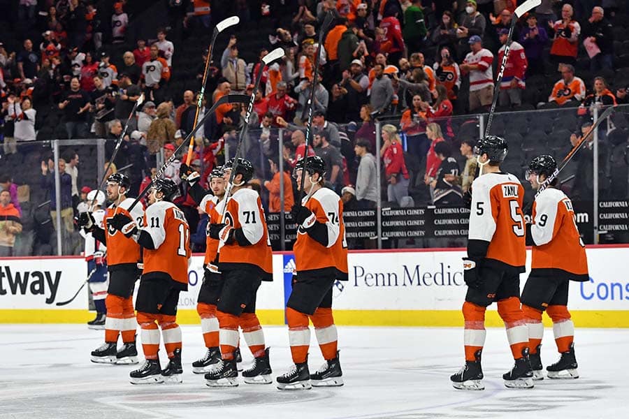 Philadelphia Flyers right wing Travis Konecny (11), right wing Tyson Foerster (71) and right wing Owen Tippett (74) acknowledge the fans after loss to the Washington Capitals during the second period at Wells Fargo Center.