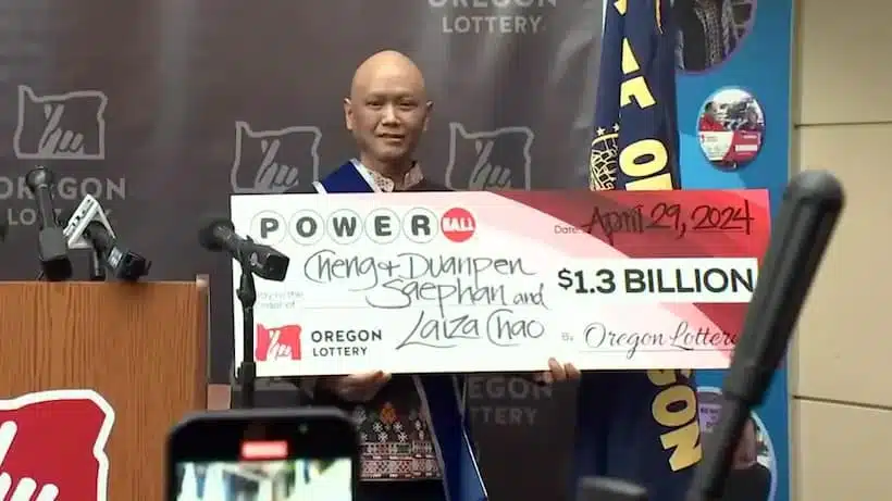 An immigrant from Laos who has cancer has won the $1.3 billion Powerball jackpot along with his wife and friend