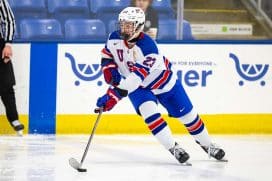 Cole Hutson #23 of Team USA skates with the puck during U18 Five Nations Tournament between Team Finland and Team USA at USA Hockey Arena on February 7, 2024 in Plymouth, Michigan.