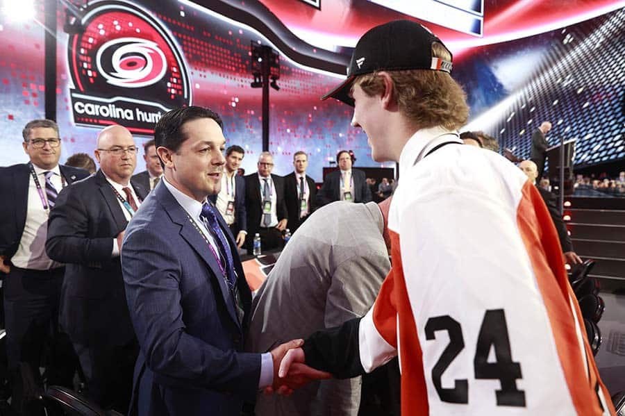 General manager Daniel Briere of the Philadelphia Flyers shakes the hand of Spencer Gill, 59th overall pick during the 2024 Upper Deck NHL Draft Rounds 2-7 at Sphere on June 29, 2024 in Las Vegas, Nevada.