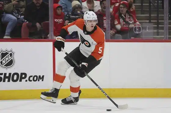 Philadelphia Flyers defenseman Egor Zamula (5) moves the puck against the Florida Panthers during the second period at Amerant Bank Arena.