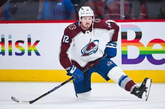 Colorado Avalanche center Ryan Johansen (12) stretches on the ice during warm-up before the game against the Montreal Canadiens at Bell Centre.