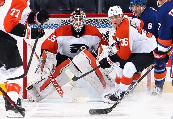 ELMONT, NEW YORK - SEPTEMBER 30: Aleksei Kolosov #35 of the Philadelphia Flyers tends net against the New York Islanders during the third period at UBS Arena on September 30, 2024 in Elmont, New York.