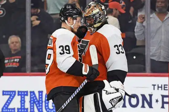 Sep 26, 2024; Philadelphia, Pennsylvania, USA; Philadelphia Flyers right wing Matvei Michkov (39) and goaltender Samuel Ersson (33) celebrate win against the New York Islanders at Wells Fargo Center.