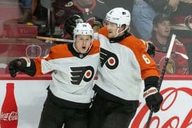 Nov 14, 2024; Ottawa, Ontario, CAN; Philadelphia Flyers right wing Matvei Michkov (39) celebrates with defenseman Travis Sanheim (6) his goal scored in overtime against the Ottawa Senators at the Canadian Tire Centre.