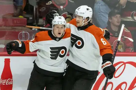 Nov 14, 2024; Ottawa, Ontario, CAN; Philadelphia Flyers right wing Matvei Michkov (39) celebrates with defenseman Travis Sanheim (6) his goal scored in overtime against the Ottawa Senators at the Canadian Tire Centre.