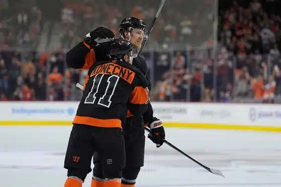 Nov 16, 2024; Philadelphia, Pennsylvania, USA; Philadelphia Flyers defenseman Travis Sanheim (6) celebrates with right wing Travis Konecny (11) after scoring a goal against the Buffalo Sabres in the first period at Wells Fargo Center.