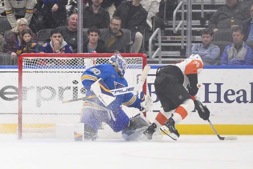 Nov 30, 2024; St. Louis, Missouri, USA; Philadelphia Flyers right wing Matvei Michkov (39) scores the game winning goal against St. Louis Blues goaltender Jordan Binnington (50) in overtime at Enterprise Center.